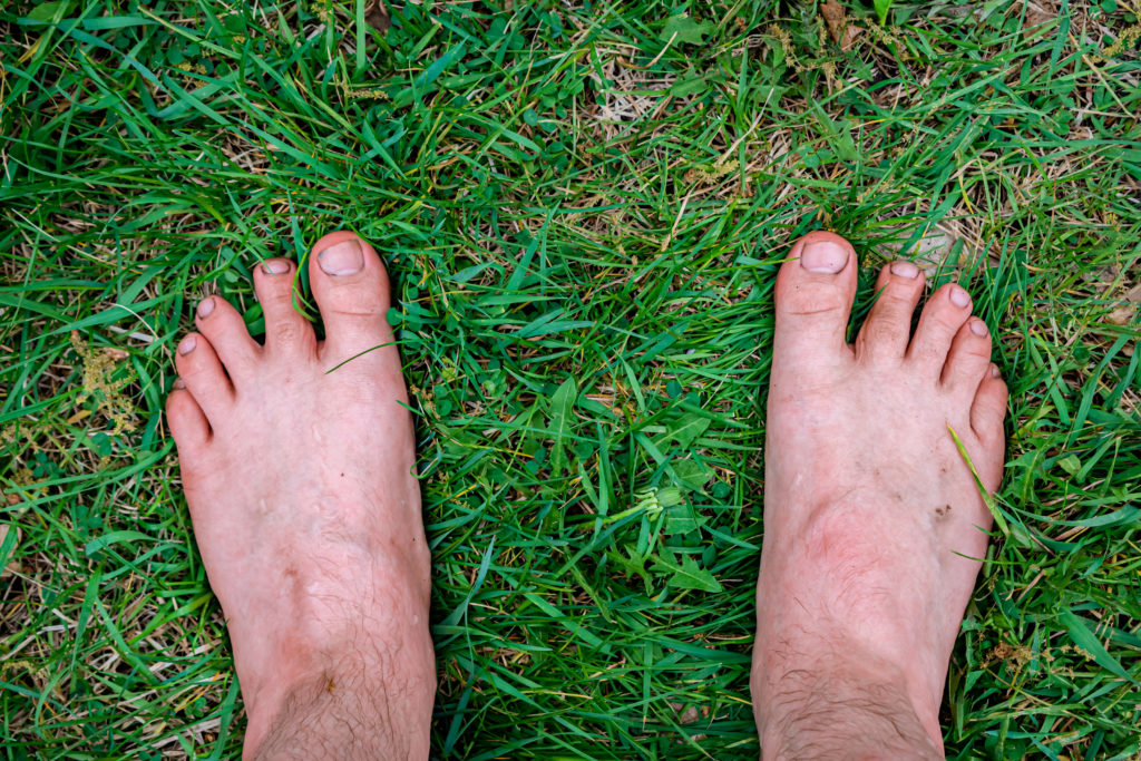 Walking barefoot on grass